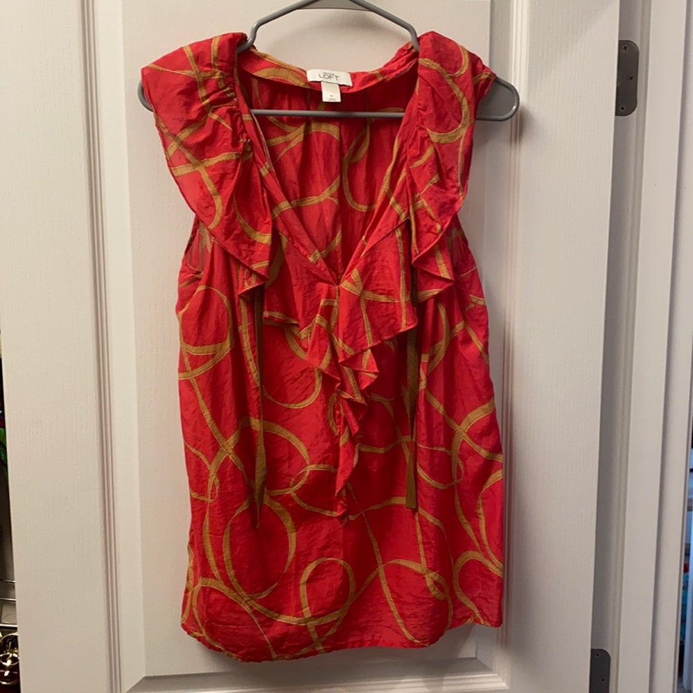 Red and tan/cognac sleeveless blouse